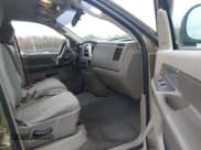 ✅ 2007 Dodge 1500 SLT • VIN: 1D7HU18P17J596244 • Лот: 43557112. Опубликован ранее на IAAI с пробегом 165 730 миль. Бесплатный доступ к архиву аукционных продаж из США и подробный отчёт об истории автомобиля на DreamBid. Изображение 5.