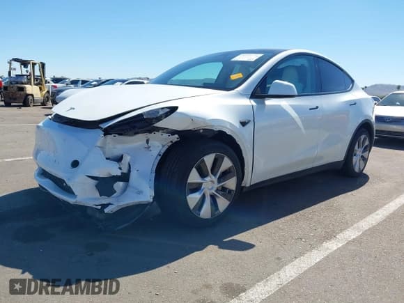 ✅ 2023 Tesla Model Y Long Range • VIN: 7SAYGDEE1PF826879 • Lot: 43393771. Listed on IAAI with 35,091 mi. Free auction sales archive from the USA and detailed vehicle history report at DreamBid. Image 2.