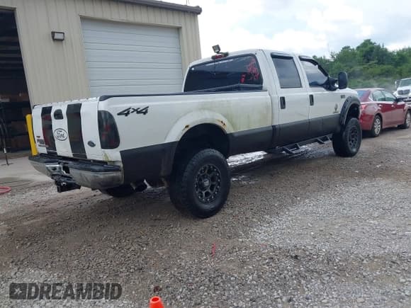 ✅ 2003 Ford F-350 XL • VIN: 1FTSW31P23ED37930 • Lot: 42341869. Listed on IAAI with 313,413 mi. Free auction sales archive from the USA and detailed vehicle history report at DreamBid. Image 4.
