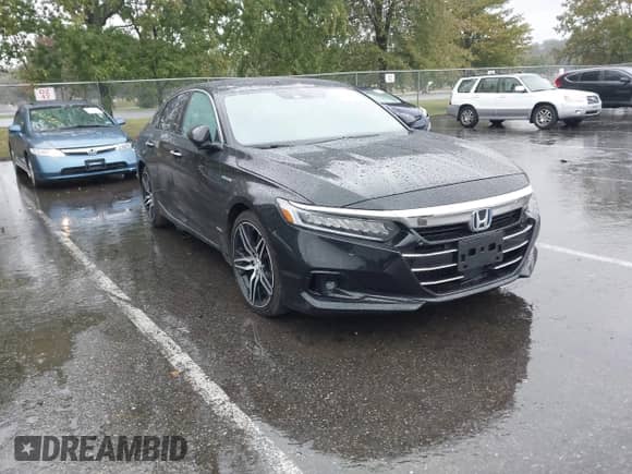 2021 Honda Accord Touring with VIN 1HGCV3F9XMA013300, listed as a IAAI auction lot 43235073 with 58,940 mi miles and . Bid and sale history available at DreamBid. Image 1.