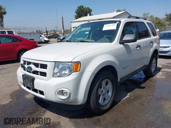 ✅ 2009 Ford Escape Hybrid • VIN: 1FMCU49379KB29694 • Lot: 42641395. Listed on IAAI with 87,225 mi. Free auction sales archive from the USA and detailed vehicle history report at DreamBid. Image 2.