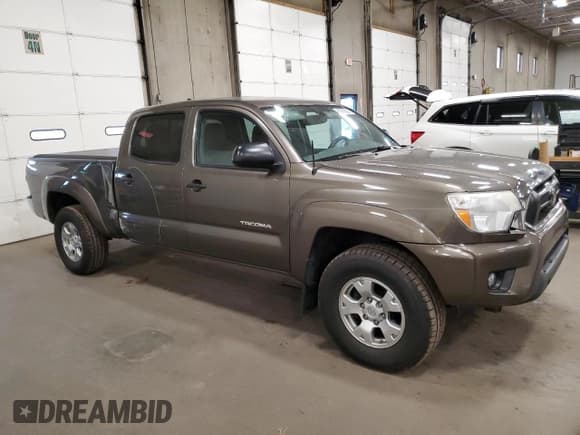 ✅ 2012 Toyota Tacoma • VIN: 3TMMU4FN1CM046437 • Lot: 82360625. Listed on Copart with 284,198 mi. Free auction sales archive from the USA and detailed vehicle history report at DreamBid. Image 4.