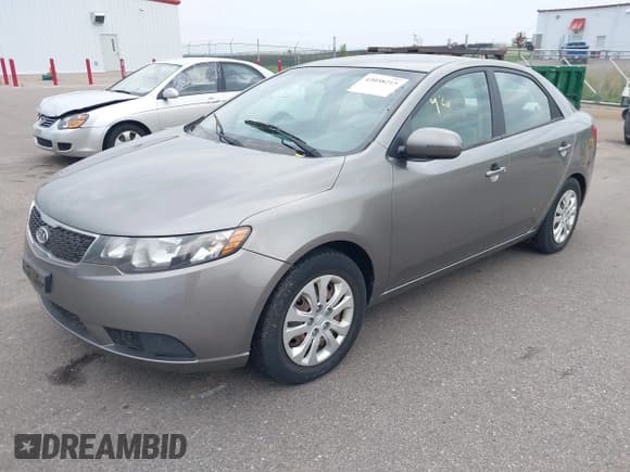 ✅ 2011 Kia Forte EX • VIN: KNAFU4A26B5402601 • Lot: 43058215. Listed on IAAI with 92,274 mi. Free auction sales archive from the USA and detailed vehicle history report at DreamBid. Image 2.