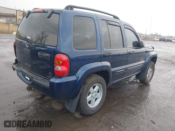✅ 2004 Jeep Liberty Limited • VIN: 1J4GL58K94W300593 • Lot: 42159169. Listed on IAAI with 128,613 mi. Free auction sales archive from the USA and detailed vehicle history report at DreamBid. Image 4.