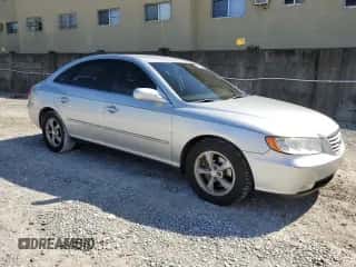 2007 Hyundai Azera GLS z VIN KMHFC46D47A242034, wystawiony jako Copart lot #76703514 z przebiegiem 124 277 mil mil oraz Szkoda całkowita • Salvage title. Historia ofert i sprzedaży dostępna na DreamBid. Obrazek 4.