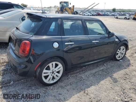 ✅ 2019 MINI Hardtop 4 Door Cooper S • VIN: WMWXU3C50K2H55085 • Lot: 69575095. Listed on Copart with 86,211 mi. Free auction sales archive from the USA and detailed vehicle history report at DreamBid. Image 3.
