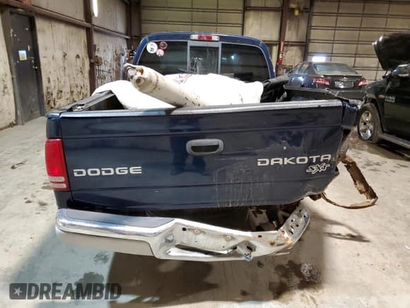 ✅ 2004 Dodge Dakota SLT • VIN: 1D7HL48N14S579565 • Lot: 87484124. Wystawiony na Copart z przebiegiem 213 127 mil. Bezpłatny archiwum sprzedaży aukcyjnych z USA i szczegółowy raport historii pojazdu na DreamBid. Zdjęcie 6.