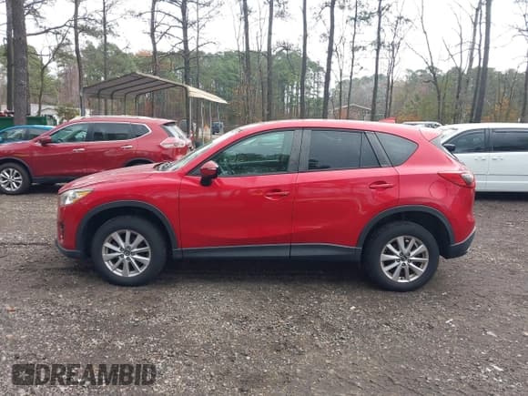 ✅ 2016 Mazda CX-5 Touring • VIN: JM3KE2CY3G0897193 • Lot: 43785978. Listed on IAAI with 119,937 mi. Free auction sales archive from the USA and detailed vehicle history report at DreamBid. Image 14.
