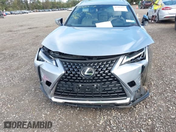 ✅ 2023 Lexus UX 250h Premium • VIN: JTHP9JBH7P2064515 • Lot: 43382117. Listed on IAAI with 32,348 mi. Free auction sales archive from the USA and detailed vehicle history report at DreamBid. Image 6.