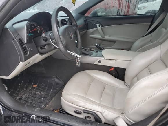 2006 Chevrolet Corvette with VIN 1G1YY26U565113187, listed as a Copart auction lot 84220834 with 153,208 mi miles and Salvage title. Bid and sale history available at DreamBid. Image 7.