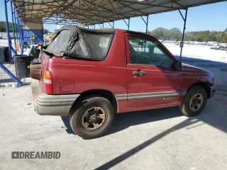 ✅ 2001 Chevrolet Tracker • VIN: 2CNBE18C016924375 • Lot: 87088435. Listed on Copart with 143,586 mi. Free auction sales archive from the USA and detailed vehicle history report at DreamBid. Image 3.
