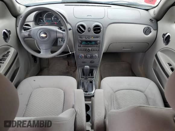 2009 Chevrolet HHR 1LT с VIN 3GNCA23B69S590785, выставлен на аукционе Copart как лот 77357414 с пробегом 104 229 миль миль и Списание • Salvage title. История ставок и продаж доступна на DreamBid. Изображение 8.