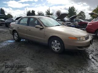 ✅ 2002 Saturn LS • VIN: 1G8JW54R52Y513297 • Лот: 70874034. Опубликован ранее на Copart с пробегом 120 567 миль. Бесплатный доступ к архиву аукционных продаж из США и подробный отчёт об истории автомобиля на DreamBid. Изображение 4.