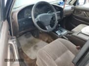 ✅ 1994 Toyota Land Cruiser • VIN: JT3DJ81W2R0084209 • Lot: 81246035. Wystawiony na Copart z przebiegiem 267 538 mil. Bezpłatny archiwum sprzedaży aukcyjnych z USA i szczegółowy raport historii pojazdu na DreamBid. Zdjęcie 8.