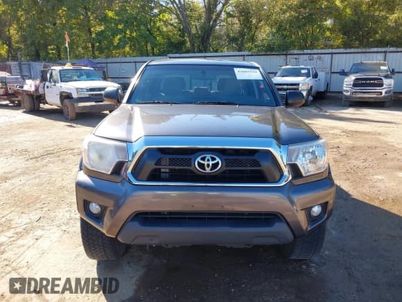 ✅ 2014 Toyota Tacoma PreRunner • VIN: 5TFJU4GN5EX058881 • Lot: 43603920. Listed on IAAI with 170,876 mi. Free auction sales archive from the USA and detailed vehicle history report at DreamBid. Image 13.