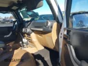 ✅ 2013 Jeep Wrangler Unlimited Sahara • VIN: 1C4BJWEG5DL554444 • Lot: 43561456. Listed on IAAI with 157,026 mi. Free auction sales archive from the USA and detailed vehicle history report at DreamBid. Image 5.