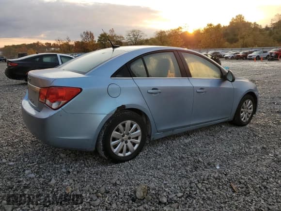 ✅ 2011 Chevrolet Cruze LS • VIN: 1G1PC5SH5B7101592 • Lot: 87284085. Listed on Copart with 166,444 mi. Free auction sales archive from the USA and detailed vehicle history report at DreamBid. Image 3.