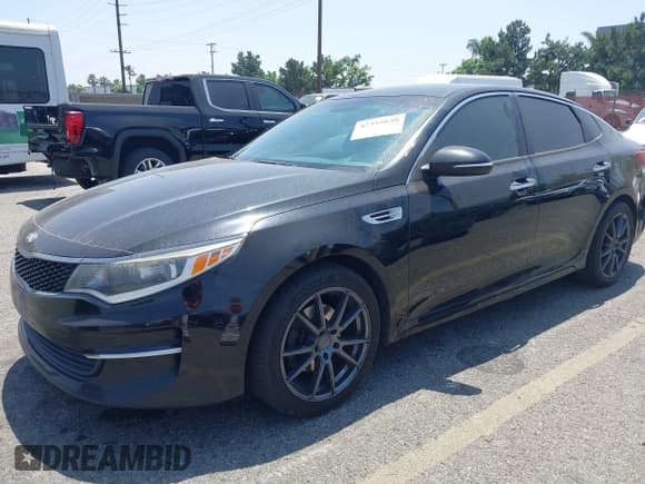 ✅ 2016 Kia Optima LX • VIN: 5XXGT4L3XGG008098 • Lot: 42355830. Listed on IAAI with 203,517 mi. Free auction sales archive from the USA and detailed vehicle history report at DreamBid. Image 2.