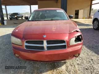 2009 Dodge Charger SXT with VIN 2B3KA33V49H601520, listed as a Copart auction lot 68101594 with 198,802 mi miles and Salvage title. Bid and sale history available at DreamBid. Image 5.