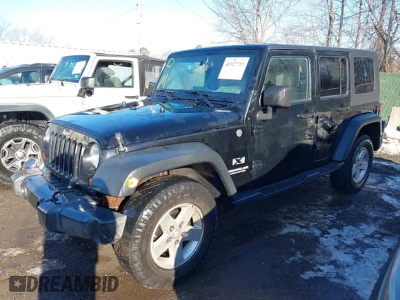 ✅ 2008 Jeep Wrangler Unlimited X • VIN: 1J4GA39148L640449 • Lot: 41327715. Listed on IAAI with 167,148 mi. Free auction sales archive from the USA and detailed vehicle history report at DreamBid. Image 17.
