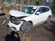 ✅ 2022 BMW X1 xDrive28i • VIN: WBXJG9C04N5V16794 • Lot: 41667535. Listed on IAAI with 55,747 mi. Free auction sales archive from the USA and detailed vehicle history report at DreamBid. Image 2.