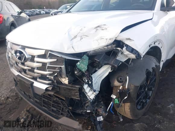 2022 Hyundai Santa Cruz SEL с VIN 5NTJBDAE0NH033592, выставлен на аукционе IAAI как лот 41126590 с пробегом 27 697 миль миль и . История ставок и продаж доступна на DreamBid. Изображение 6.