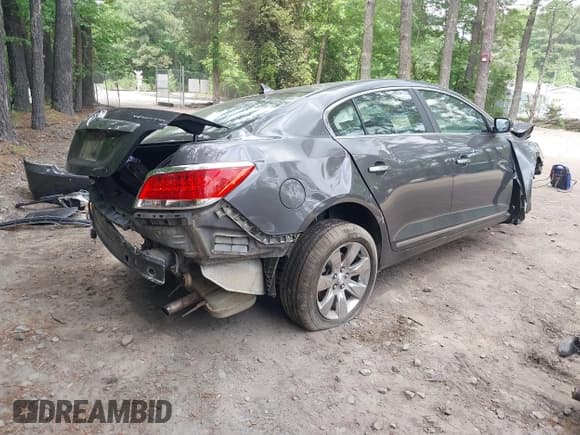 ✅ 2013 Buick LaCrosse Leather • VIN: 1G4GC5E31DF123570 • Lot: 42222947. Wystawiony na IAAI z przebiegiem 122 462 mil. Bezpłatny archiwum sprzedaży aukcyjnych z USA i szczegółowy raport historii pojazdu na DreamBid. Zdjęcie 4.