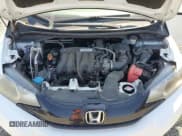 ✅ 2016 Honda Fit LX • VIN: JHMGK5H59GX009883 • Lot: 81238545. Listed on Copart with 96,970 mi. Free auction sales archive from the USA and detailed vehicle history report at DreamBid. Image 11.