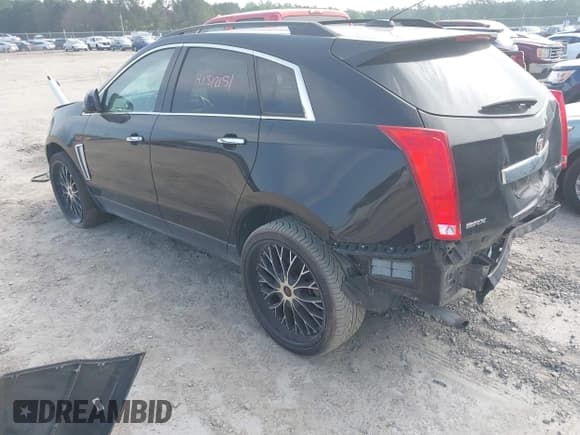 ✅ 2015 Cadillac SRX • VIN: 3GYFNAE38FS593171 • Lot: 42274159. Wystawiony na IAAI z przebiegiem 104 049 mil. Bezpłatny archiwum sprzedaży aukcyjnych z USA i szczegółowy raport historii pojazdu na DreamBid. Zdjęcie 3.