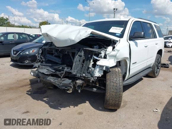 2020 Chevrolet Tahoe Premier with VIN 1GNSKCKJ8LR134496, listed as a IAAI auction lot 43360495 with 118,770 mi miles and . Bid and sale history available at DreamBid. Image 17.