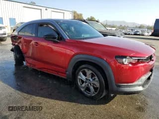 ✅ 2022 Mazda MX-30 Premium Plus • VIN: JM1DRADB2N0101069 • Lot: 85101755. Wystawiony na Copart z przebiegiem 36 193 mil. Bezpłatny archiwum sprzedaży aukcyjnych z USA i szczegółowy raport historii pojazdu na DreamBid. Zdjęcie 4.