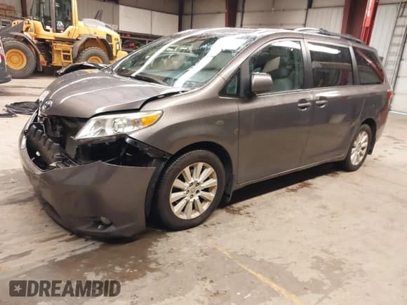 ✅ 2015 Toyota Sienna Limited • VIN: 5TDDK3DC4FS123467 • Lot: 41977448. Listed on IAAI with 164,467 mi. Free auction sales archive from the USA and detailed vehicle history report at DreamBid. Image 2.