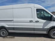 ✅ 2024 Ford Transit Cargo • VIN: 1FTBR1C8XRKA46961 • Lot: 41823255. Listed on IAAI with 4,292 mi. Free auction sales archive from the USA and detailed vehicle history report at DreamBid. Image 14.