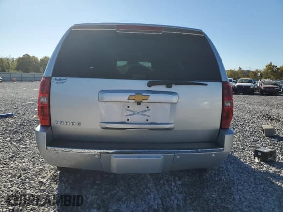 ✅ 2014 Chevrolet Tahoe LTZ • VIN: 1GNSCCE03ER216526 • Lot: 87282565. Listed on Copart with 154,021 mi. Free auction sales archive from the USA and detailed vehicle history report at DreamBid. Image 6.
