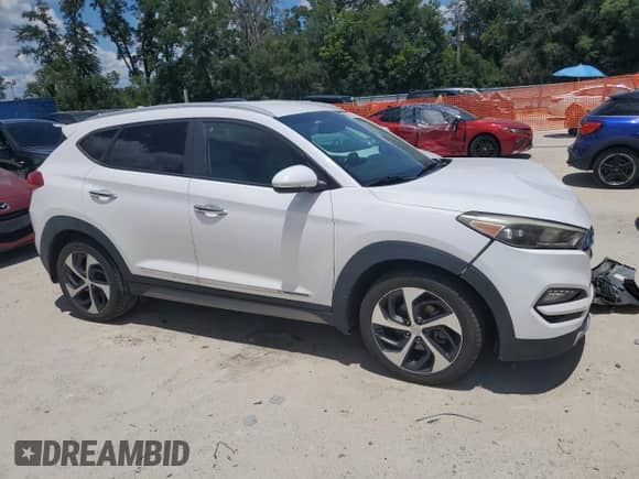 2017 Hyundai Tucson Night Edition with VIN KM8J3CA27HU328559, listed as a Copart auction lot 60818115 with 85,222 mi miles and Salvage title. Bid and sale history available at DreamBid. Image 4.