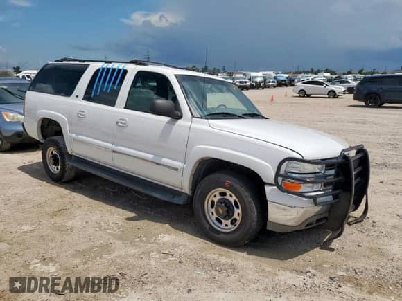 2001 Chevrolet Suburban LT with VIN 3GNGK26G91G239589, listed as a Copart auction lot 61990985 with 218,512 mi miles and Salvage title. Bid and sale history available at DreamBid. Image 4.