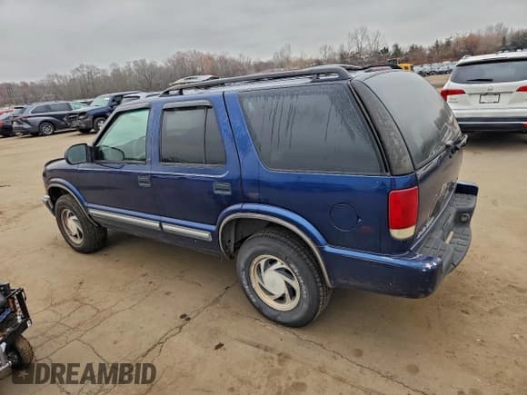 ✅ 2000 Chevrolet Blazer LT • VIN: 1GNDT13WXY2191514 • Lot: 93420615. Listed on Copart with 170,197 mi. Free auction sales archive from the USA and detailed vehicle history report at DreamBid. Image 2.