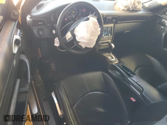 ✅ 2005 Porsche 911 Carrera 997 • VIN: WP0AA29935S715591 • Lot: 80885594. Wystawiony na Copart z przebiegiem 125 878 mil. Bezpłatny archiwum sprzedaży aukcyjnych z USA i szczegółowy raport historii pojazdu na DreamBid. Zdjęcie 8.