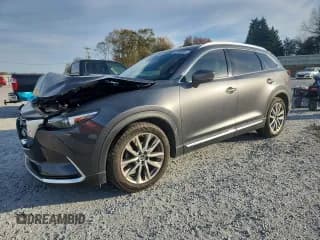 ✅ 2019 Mazda CX-9 Grand Touring • VIN: JM3TCADY2K0301261 • Lot: 92999095. Listed on Copart with 104,686 mi. Free auction sales archive from the USA and detailed vehicle history report at DreamBid. Image 1.