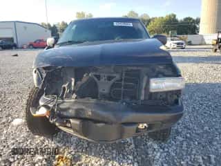 2000 Chevrolet Blazer LS z VIN 1GNCT18WXYK265020, wystawiony jako Copart lot #72423834 z przebiegiem 139 365 mil mil oraz Czysty tytuł • Clean title. Historia ofert i sprzedaży dostępna na DreamBid. Obrazek 5.