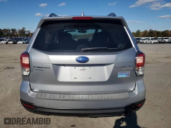 2017 Subaru Forester Limited with VIN JF2SJALC2HH407768, listed as a Copart auction lot 87364875 with 36,703 mi miles and Salvage title. Bid and sale history available at DreamBid. Image 6.