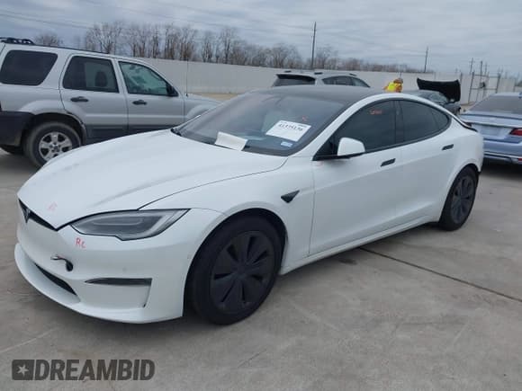 ✅ 2021 Tesla Model S Plaid • VIN: 5YJSA1E64MF452744 • Lot: 41375136. Listed on IAAI with Not provided. Free auction sales archive from the USA and detailed vehicle history report at DreamBid. Image 2.