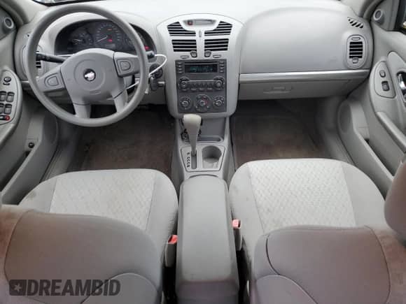 2005 Chevrolet Malibu z VIN 1G1ZS52F55F337650, wystawiony jako Copart lot #82815554 z przebiegiem 77 146 mil mil oraz Szkoda całkowita • Salvage title. Historia ofert i sprzedaży dostępna na DreamBid. Obrazek 8.