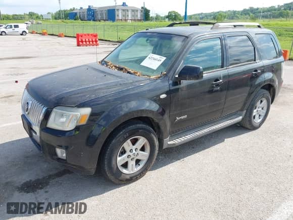 2009 Mercury Mariner Hybrid с VIN 4M2CU29349KJ13648, выставлен на аукционе IAAI как лот 42244149 с пробегом 169 921 миль миль и . История ставок и продаж доступна на DreamBid. Изображение 2.
