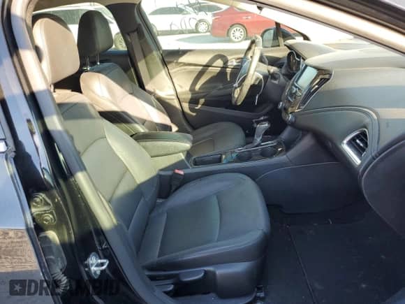 2016 Chevrolet Cruze Premier z VIN 1G1BG5SM3G7278712, wystawiony jako Copart lot #62579392 z przebiegiem Nie podano mil oraz . Historia ofert i sprzedaży dostępna na DreamBid. Obrazek 5.