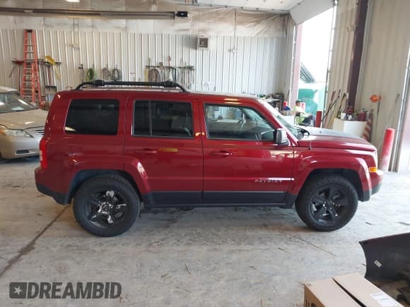 ✅ 2016 Jeep Patriot High Altitude • VIN: 1C4NJRFB6GD651250 • Lot: 43173260. Listed on IAAI with 104,945 mi. Free auction sales archive from the USA and detailed vehicle history report at DreamBid. Image 13.