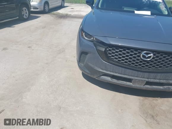 ✅ 2025 Mazda CX-50 S Premium • VIN: 7MMVABDM7SN335516 • Лот: 42915245. Опубликован ранее на IAAI с пробегом 9 369 миль. Бесплатный доступ к архиву аукционных продаж из США и подробный отчёт об истории автомобиля на DreamBid. Изображение 12.