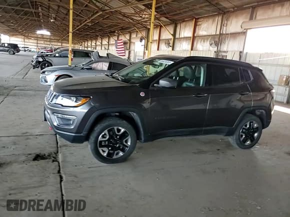 ✅ 2017 Jeep Compass Trailhawk • VIN: 3C4NJDDB4HT606972 • Lot: 85425365. Listed on Copart with 144,783 mi. Free auction sales archive from the USA and detailed vehicle history report at DreamBid. Image 14.
