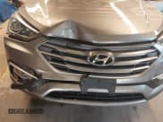 ✅ 2018 Hyundai Santa Fe 2.4L • VIN: 5NMZUDLB2JH072593 • Лот: 42846562. Опубликован ранее на IAAI с пробегом 56 789 миль. Бесплатный доступ к архиву аукционных продаж из США и подробный отчёт об истории автомобиля на DreamBid. Изображение 6.
