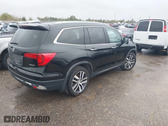 ✅ 2018 Honda Pilot Touring • VIN: 5FNYF5H99JB017044 • Lot: 43821143. Listed on IAAI with 156,739 mi. Free auction sales archive from the USA and detailed vehicle history report at DreamBid. Image 4.
